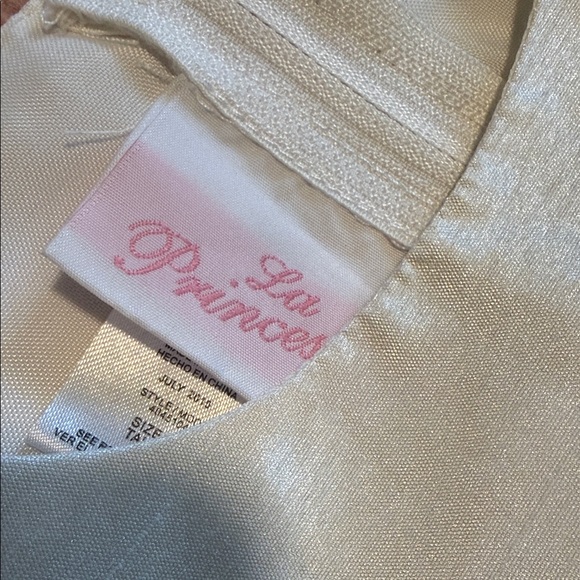 Charming Cream Kids Dress with Floral Detail. - Picture 5 of 6